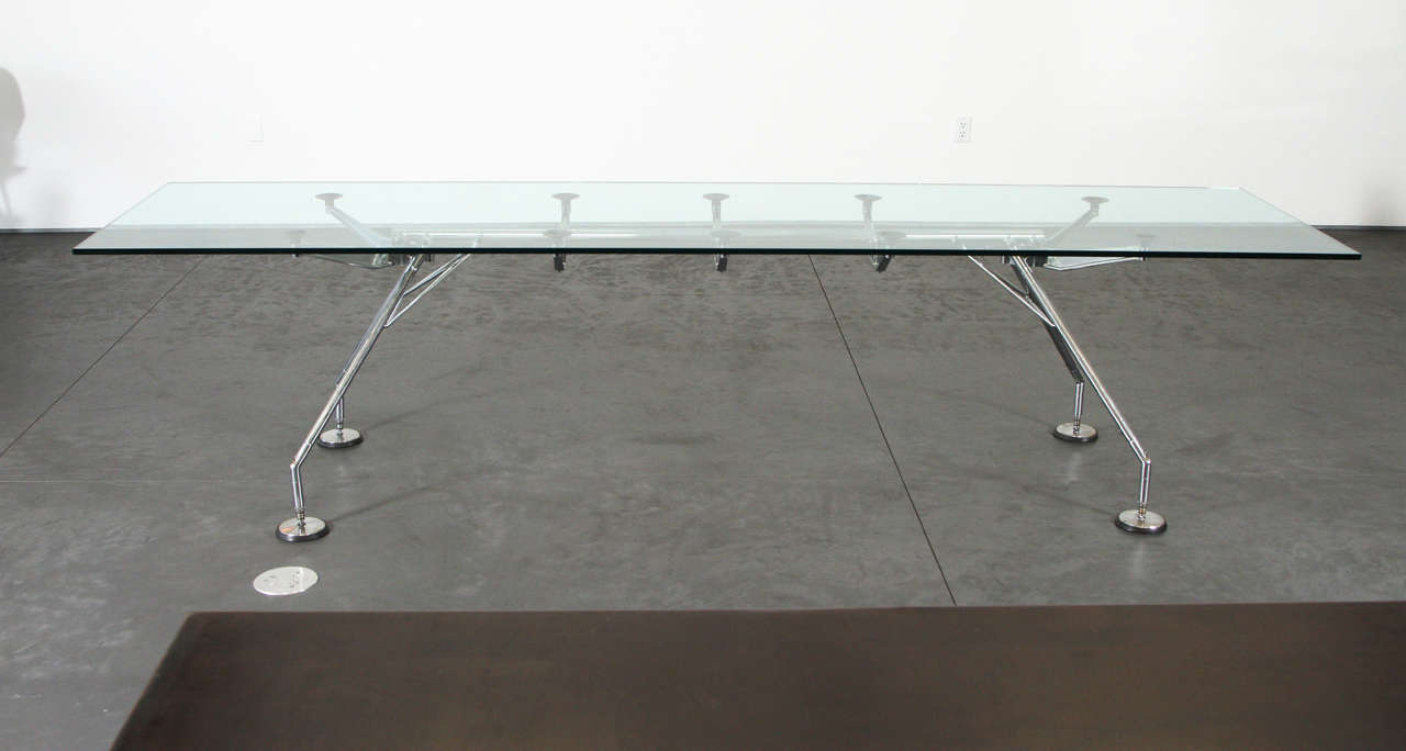 Norman Foster for Techno table with glass top and adjustable aluminum legs called Nomos desk and table.